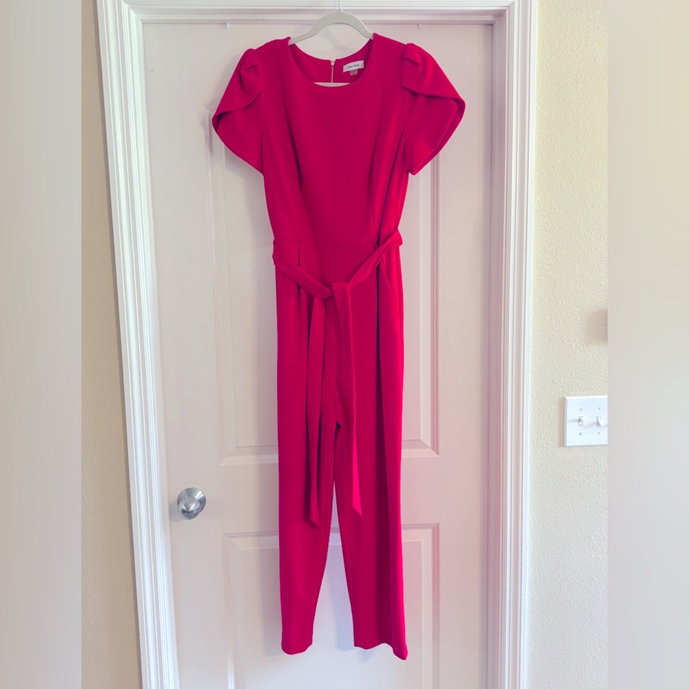 Calvin Klein Women’s Romper Jumpsuit Size 12 with pleats/pockets Worn once.